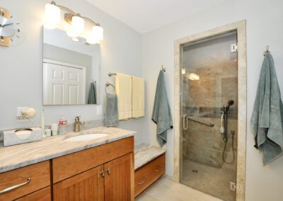 bathroom with mirror and towel