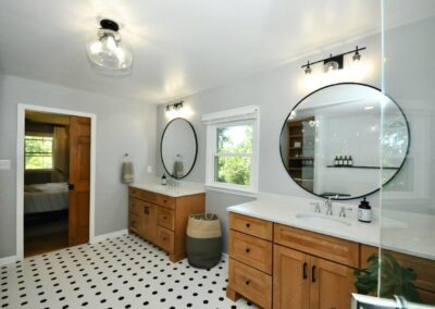 two round shape mirror in bathroom